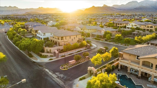 bird's eye view featuring a residential view and a mountain view