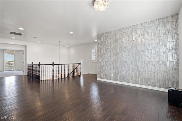 empty room featuring visible vents, a healthy amount of sunlight, and recessed lighting