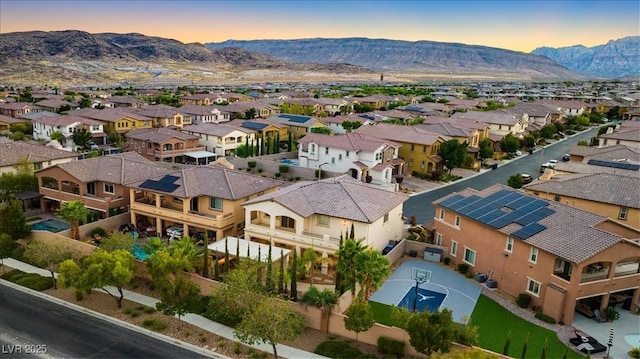 aerial perspective of suburban area with mountains