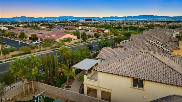 bird's eye view featuring a mountain view and a residential view