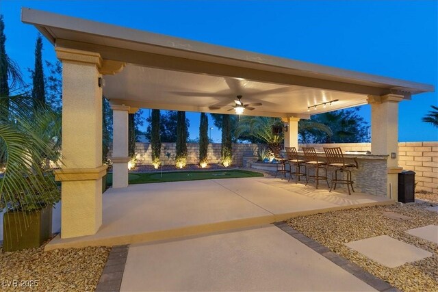 view of patio / terrace featuring a ceiling fan and a fenced backyard