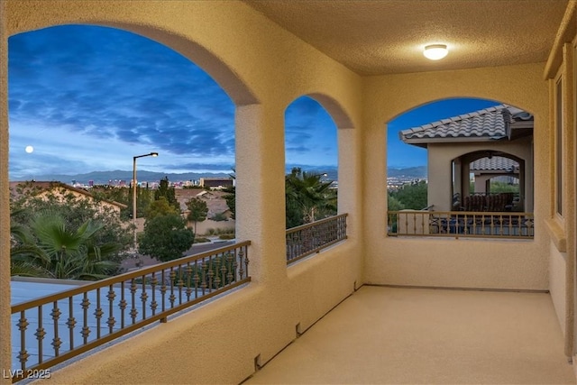 balcony featuring a mountain view