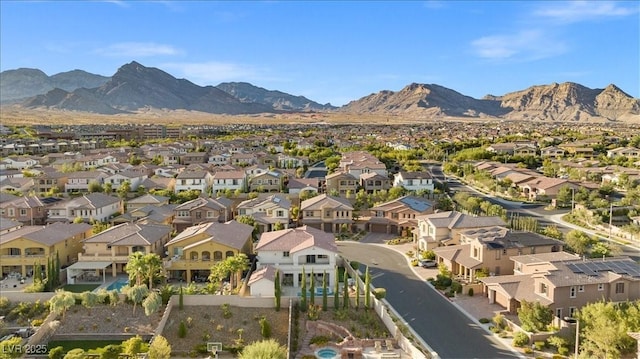 aerial view with a mountain view and a residential view