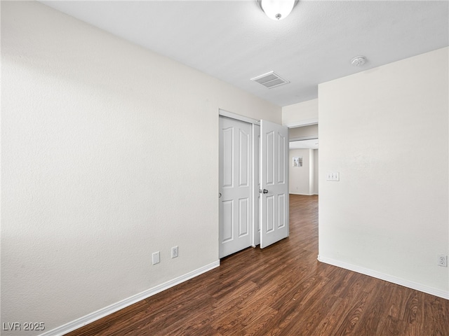 1153 Stormy Valley Rd, Las Vegas, NV 89123 - spare room featuring baseboards, wood finished floors, and a smoke detector