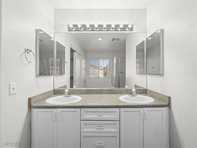 1153 Stormy Valley Rd, Las Vegas, NV 89123 - full bath with double vanity and a shower stall