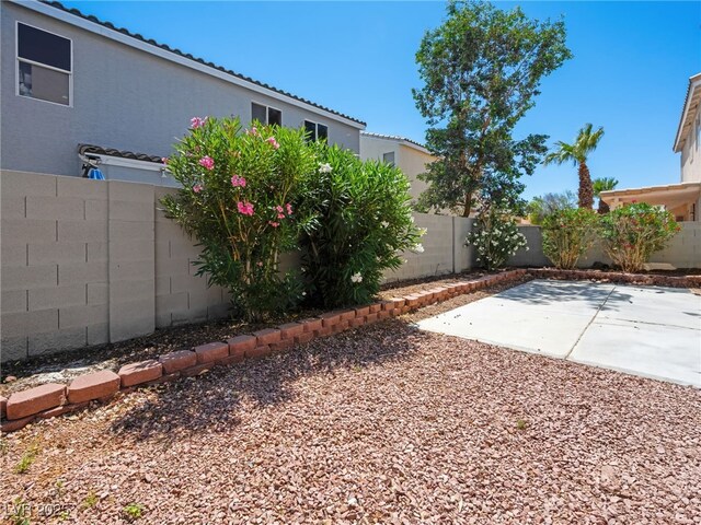 1153 Stormy Valley Rd, Las Vegas, NV 89123 - fenced backyard featuring a patio area