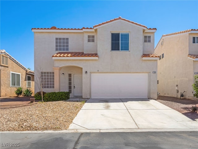 1153 Stormy Valley Rd, Las Vegas, NV 89123 - mediterranean / spanish-style home featuring a tiled roof, an attached garage, stucco siding, and concrete driveway