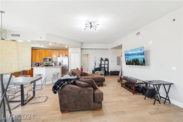 8255 Las Vegas Blvd Unit 713, Las Vegas, NV 89123 - living room with baseboards, recessed lighting, visible vents, and light wood-type flooring