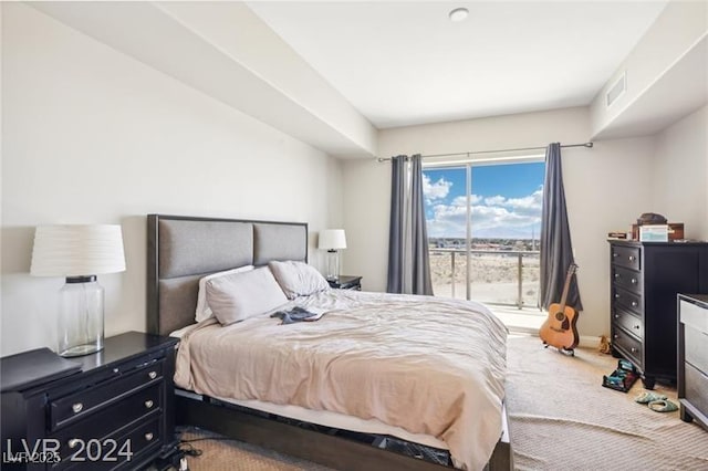 8255 Las Vegas Blvd Unit 713, Las Vegas, NV 89123 - carpeted bedroom featuring access to outside and visible vents