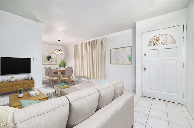 living area with light tile patterned floors