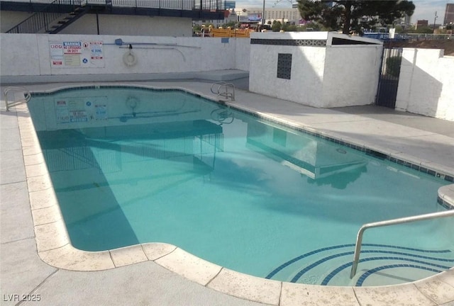 community pool featuring a patio