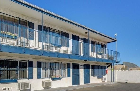 view of property with cooling unit
