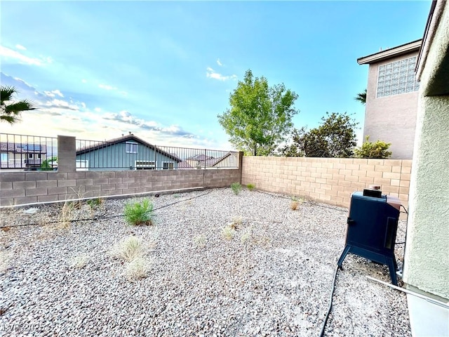 view of yard featuring a fenced backyard