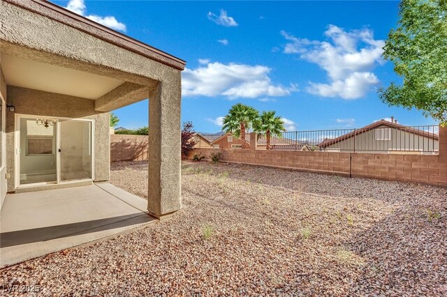 2749 Invermark St, Henderson, NV 89044 - fenced backyard with a patio area