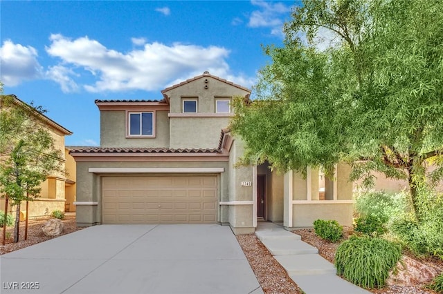 2749 Invermark St, Henderson, NV 89044 - mediterranean / spanish house featuring driveway, a garage, stucco siding, and a tiled roof