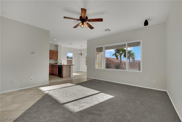 2749 Invermark St, Henderson, NV 89044 - unfurnished living room featuring a chandelier, a ceiling fan, light tile patterned flooring, and recessed lighting