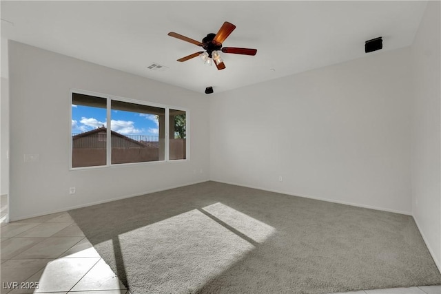 2749 Invermark St, Henderson, NV 89044 - unfurnished room featuring a ceiling fan, light carpet, and light tile patterned flooring