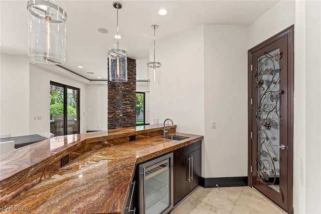 9501 Balatta Canyon Ct, Las Vegas, NV 89144 - bar with light tile patterned floors, indoor wet bar, a sink, wine cooler, and recessed lighting