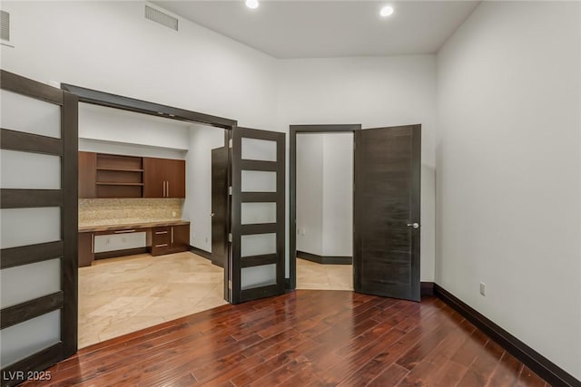 9501 Balatta Canyon Ct, Las Vegas, NV 89144 - unfurnished bedroom featuring visible vents, wood finished floors, baseboards, and recessed lighting