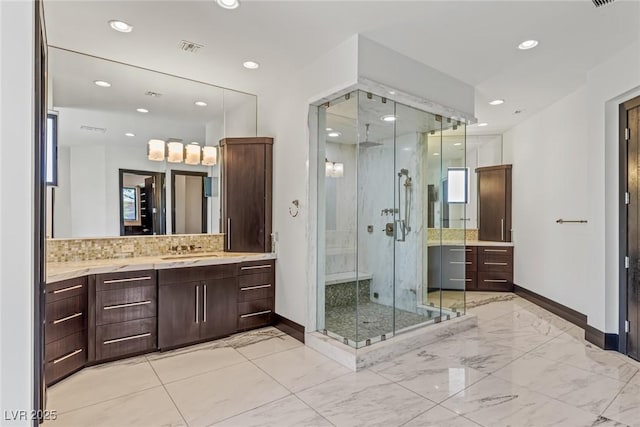 9501 Balatta Canyon Ct, Las Vegas, NV 89144 - full bathroom with vanity, baseboards, a shower stall, and visible vents
