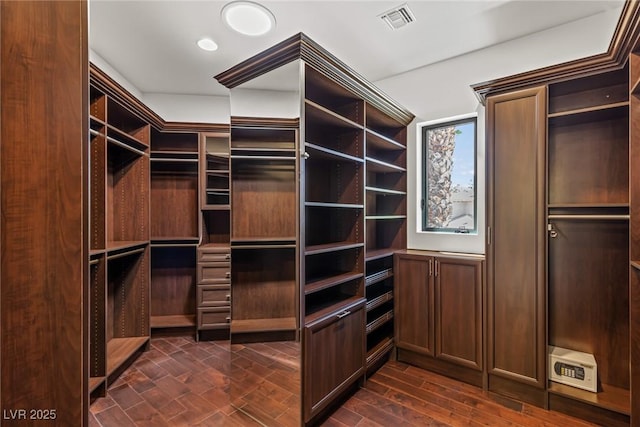9501 Balatta Canyon Ct, Las Vegas, NV 89144 - walk in closet featuring visible vents and dark wood-style flooring