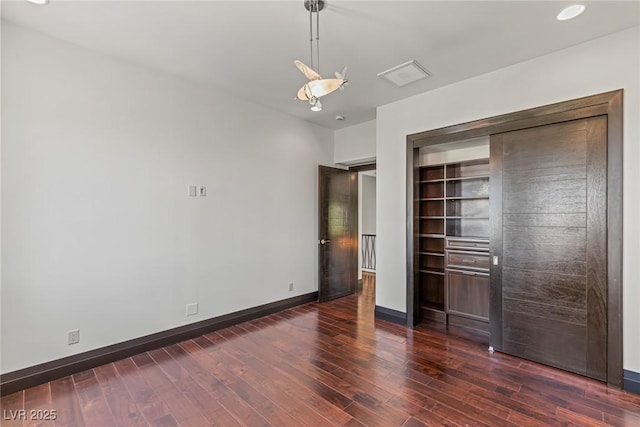 9501 Balatta Canyon Ct, Las Vegas, NV 89144 - unfurnished bedroom with recessed lighting, baseboards, visible vents, and dark wood finished floors