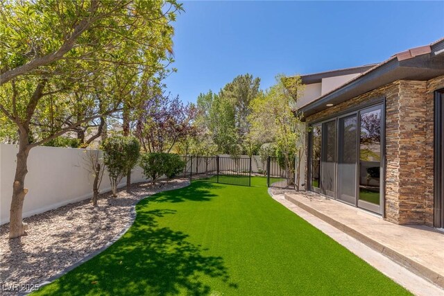 9501 Balatta Canyon Ct, Las Vegas, NV 89144 - view of yard with a fenced backyard