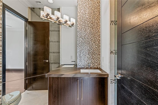 9501 Balatta Canyon Ct, Las Vegas, NV 89144 - full bath featuring toilet, tile patterned floors, visible vents, and a sink
