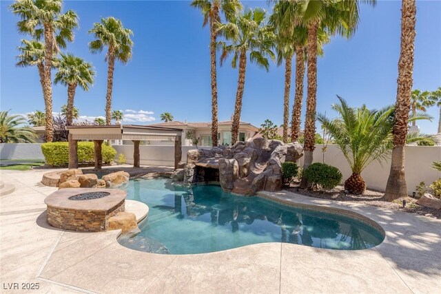 9501 Balatta Canyon Ct, Las Vegas, NV 89144 - view of pool with a fenced backyard, an outdoor fire pit, a patio, and a fenced in pool