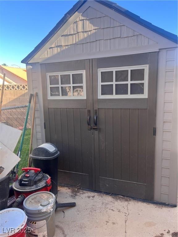 1676 Divinity St, Las Vegas, NV 89142 - view of shed with fence
