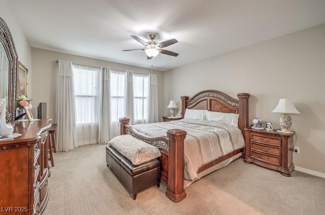 8257 Skye Peak St, Las Vegas, NV 89166 - bedroom with light colored carpet, baseboards, and a ceiling fan