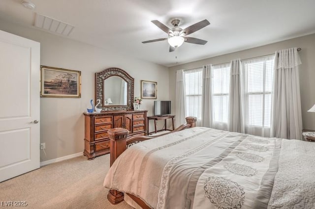 8257 Skye Peak St, Las Vegas, NV 89166 - bedroom featuring light carpet, baseboards, and a ceiling fan