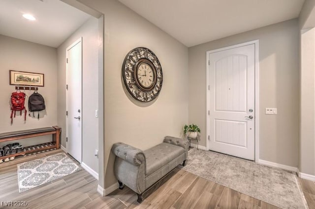 8257 Skye Peak St, Las Vegas, NV 89166 - foyer entrance with wood finished floors, baseboards, and recessed lighting