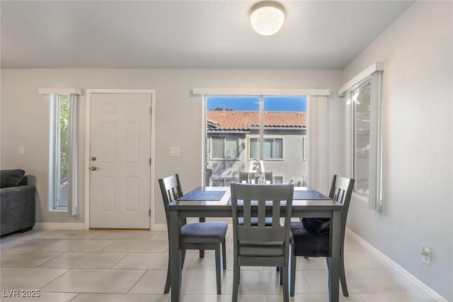 3066 Tarpon Dr Unit 204, Las Vegas, NV 89120 - dining area featuring light tile patterned flooring and baseboards