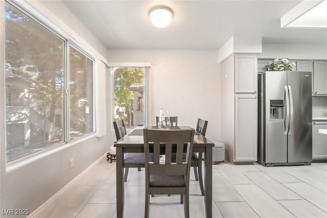 3066 Tarpon Dr Unit 204, Las Vegas, NV 89120 - dining space featuring baseboards and light tile patterned flooring