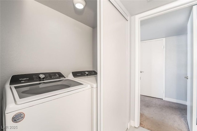 3066 Tarpon Dr Unit 204, Las Vegas, NV 89120 - washroom with baseboards, carpet flooring, laundry area, and washer and clothes dryer