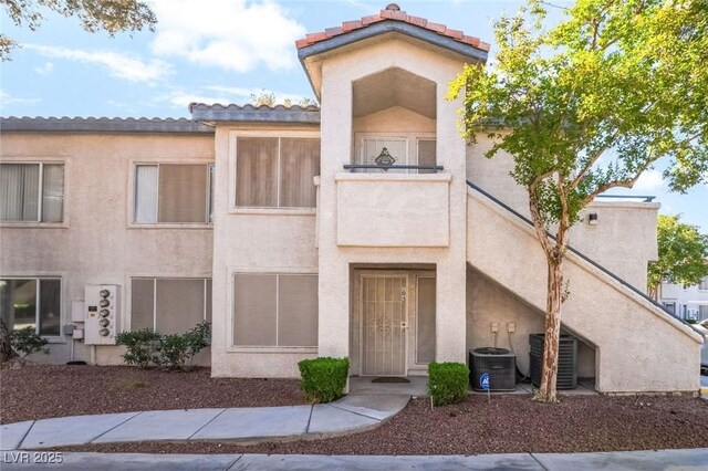 3066 Tarpon Dr Unit 204, Las Vegas, NV 89120 - view of property featuring central air condition unit