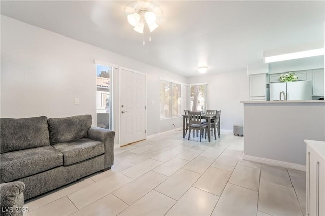 3066 Tarpon Dr Unit 204, Las Vegas, NV 89120 - living area featuring baseboards and a ceiling fan