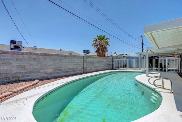 view of swimming pool featuring a fenced backyard, cooling unit, and a patio