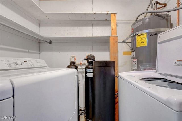 washroom with washer / dryer and strapped water heater