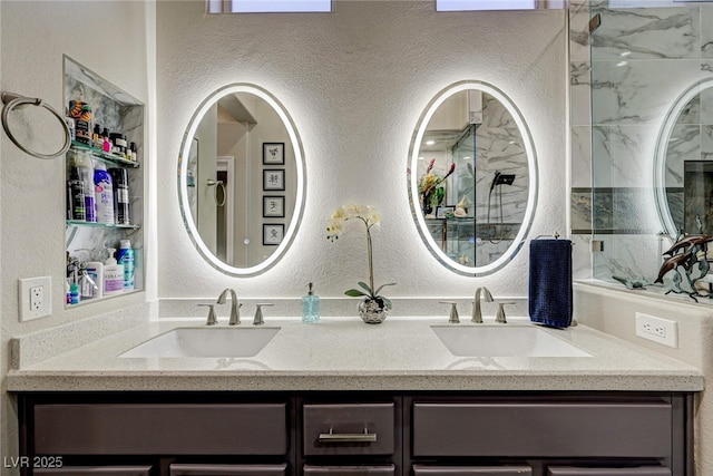 2625 Youngdale Dr, Las Vegas, NV 89134 - full bathroom featuring a textured wall and double vanity