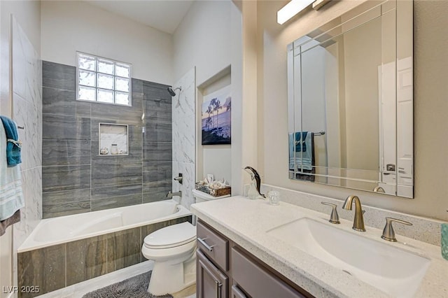 2625 Youngdale Dr, Las Vegas, NV 89134 - bathroom featuring tiled shower / bath, toilet, and vanity