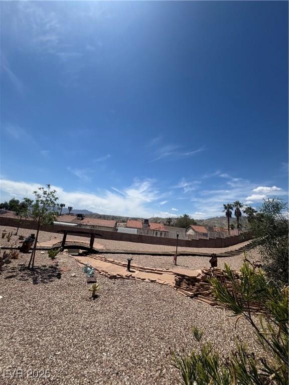 view of yard with fence