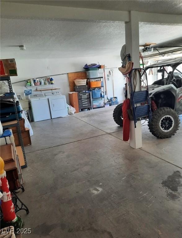 garage with washer and dryer