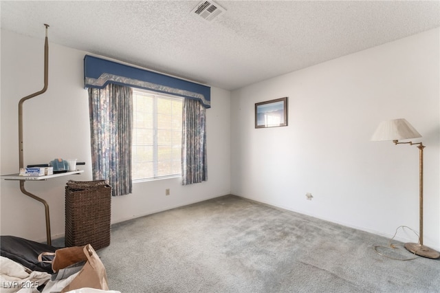 7617 Sea Cliff Way, Las Vegas, NV 89128 - unfurnished bedroom featuring carpet and a textured ceiling