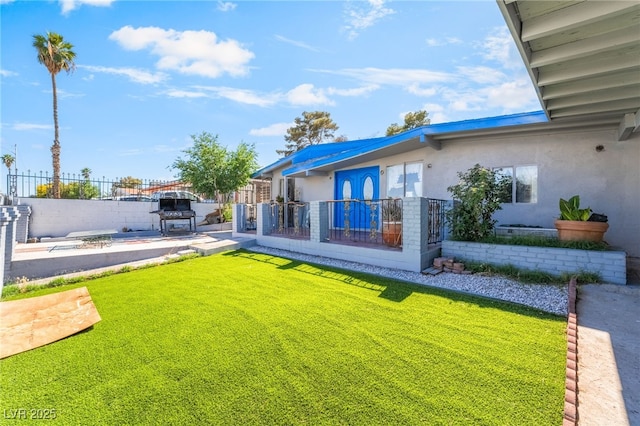 1708 Weeping Willow Ln, Las Vegas, NV 89104 - rear view of house featuring stucco siding