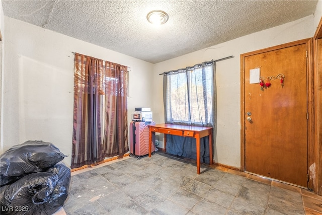 1708 Weeping Willow Ln, Las Vegas, NV 89104 - entryway featuring a textured ceiling