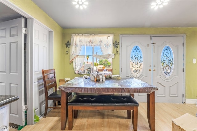 1708 Weeping Willow Ln, Las Vegas, NV 89104 - dining space featuring wood finished floors and french doors
