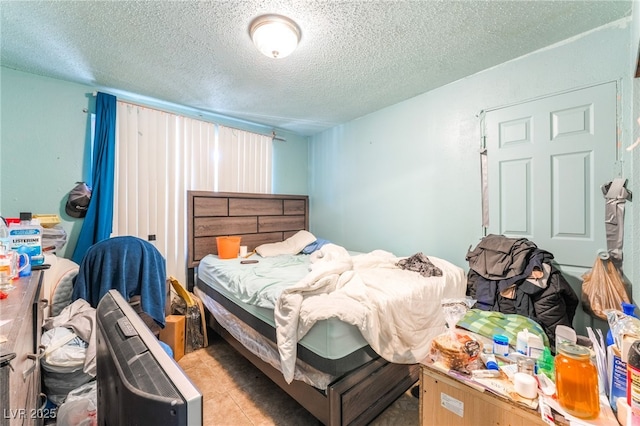 1708 Weeping Willow Ln, Las Vegas, NV 89104 - bedroom featuring a textured ceiling