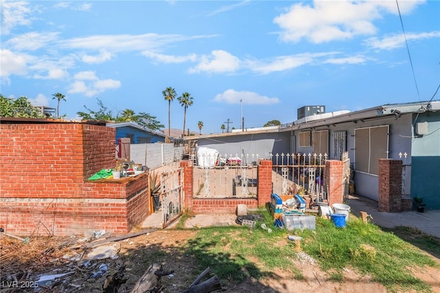 1708 Weeping Willow Ln, Las Vegas, NV 89104 - rear view of house featuring fence and cooling unit